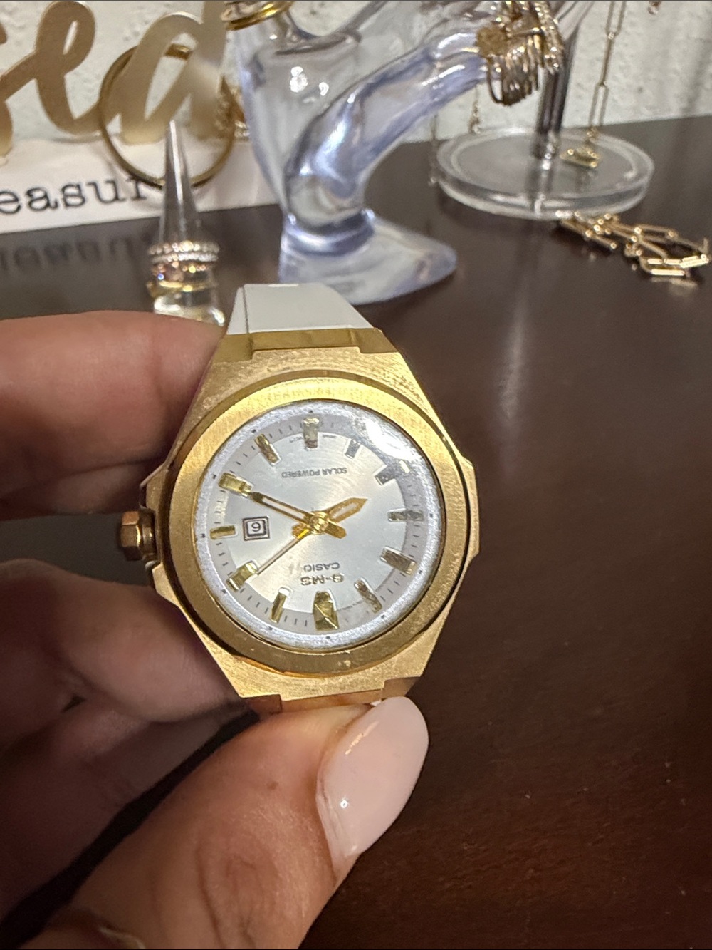 G-Shock Gold Case Watch with White Strap and Gold Dial Accents